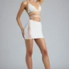 Top de bikini Liberty cu bretele încrucișate și ornamente, în culoarea Ivory Top de bikini Liberty cu bretele încrucișate și ornamente, în culoarea Ivory