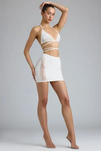 Fustă mini Joni cu talie medie și ornamente, în culoarea Ivory