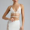 Fustă mini Joni cu talie medie și ornamente, în culoarea Ivory Fustă mini Joni cu talie medie și ornamente, în culoarea Ivory
