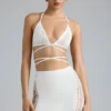 Fustă mini Joni cu talie medie și ornamente, în culoarea Ivory Fustă mini Joni cu talie medie și ornamente, în culoarea Ivory