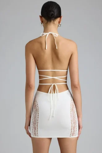Fustă mini Joni cu talie medie și ornamente, în culoarea Ivory