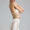 Fustă mini Joni cu talie medie și ornamente, în culoarea Ivory Fustă mini Joni cu talie medie și ornamente, în culoarea Ivory