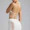 Top de bikini Liberty cu bretele încrucișate și ornamente, în culoarea Ivory Top de bikini Liberty cu bretele încrucișate și ornamente, în culoarea Ivory