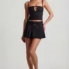 Fustă mini plisată cu talie joasă și curea Velora, negru Fustă mini plisată cu talie joasă și curea Velora, negru