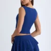 Fustă mini plisată în straturi, cu talie joasă, model Nada, în albastru marin
