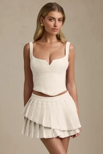 Fustă mini plisată în straturi, cu talie joasă, model Nada, în culoarea Ivory