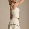 Fustă mini plisată în straturi, cu talie joasă, model Nada, în culoarea Ivory Fustă mini plisată în straturi, cu talie joasă, model Nada, în culoarea Ivory