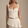 Fustă mini plisată în straturi, cu talie joasă, model Nada, în culoarea Ivory Fustă mini plisată în straturi, cu talie joasă, model Nada, în culoarea Ivory