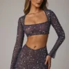 Fustă mini transparentă Thalassa cu decupaj în V și ornamente, în culoarea albastru închis Fustă mini transparentă Thalassa cu decupaj în V și ornamente, în culoarea albastru închis