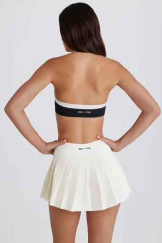 Fustă-pantalon de tenis plisată, moale, cu talie joasă, în culoarea Ivory Fustă-pantalon de tenis plisată, moale, cu talie joasă, în culoarea Ivory
