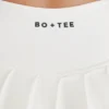 Fustă-pantalon de tenis plisată, moale, cu talie joasă, în culoarea Ivory
