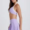 Fustă-pantalon de tenis plisată Soft Active cu talie joasă, în culoarea liliac Fustă-pantalon de tenis plisată Soft Active cu talie joasă, în culoarea liliac