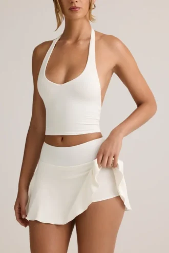 Fustă-pantalon mini cu talie joasă și volane Keoni Modal, albă