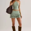 Fustă-pantalon mini cu volane din modal Azaria, de culoare verde salvie Fustă-pantalon mini cu volane din modal Azaria, de culoare verde salvie