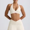 Fustă-pantalon mini din jersey periat, cu talie încrucișată, în culoarea Ivory Marl Fustă-pantalon mini din jersey periat, cu talie încrucișată, în culoarea Ivory Marl
