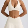 Fustă-pantalon mini din jersey periat, cu talie încrucișată, în culoarea Ivory Marl Fustă-pantalon mini din jersey periat, cu talie încrucișată, în culoarea Ivory Marl