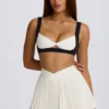 Fustă-pantalon mini plisată, moale și sport, în nuanța Ivory Fustă-pantalon mini plisată, moale și sport, în nuanța Ivory