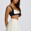 Fustă-pantalon mini plisată, moale și sport, în nuanța Ivory Fustă-pantalon mini plisată, moale și sport, în nuanța Ivory