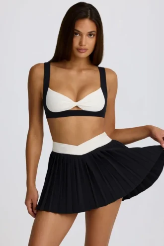 Fustă-pantalon mini plisată Soft Active Crossover în negru Fustă-pantalon mini plisată Soft Active Crossover în negru