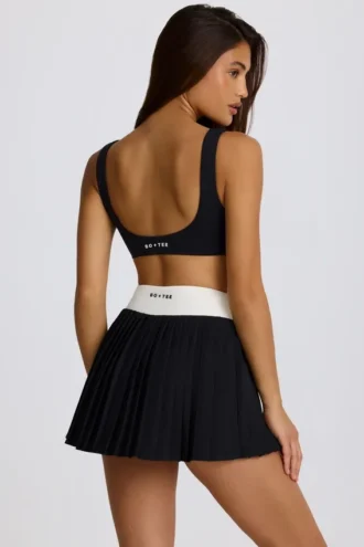 Fustă-pantalon mini plisată Soft Active Crossover în negru Fustă-pantalon mini plisată Soft Active Crossover în negru