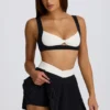 Fustă-pantalon mini plisată Soft Active Crossover în negru Fustă-pantalon mini plisată Soft Active Crossover în negru