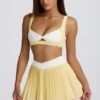 Fustă-pantalon mini plisată Soft Active cu decupaj încrucișat, culoare lămâie Fustă-pantalon mini plisată Soft Active cu decupaj încrucișat, culoare lămâie