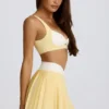 Fustă-pantalon mini plisată Soft Active cu decupaj încrucișat, culoare lămâie Fustă-pantalon mini plisată Soft Active cu decupaj încrucișat, culoare lămâie