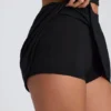Fustă-pantalon mini Solene din modal, cu croi în A, în negru Fustă-pantalon mini Solene din modal, cu croi în A, în negru