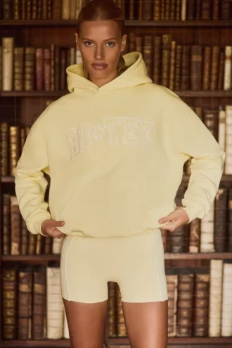 Hanorac oversized brodat în galben deschis