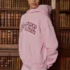 Hanorac oversized brodat în roz pudră Hanorac oversized brodat în roz pudră