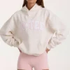 Hanorac oversized cu aplicație, în model cu buline de culoare ivoriu