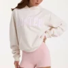 Hanorac oversized cu aplicație, în model cu buline de culoare ivoriu