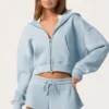 Hanorac oversized cu glugă și fermoar în albastru pudră Hanorac oversized cu glugă și fermoar în albastru pudră