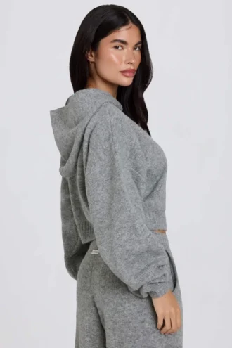 Hanorac scurt cu glugă, din tricot moale, cu fermoar, în culoarea gri Hanorac scurt cu glugă, din tricot moale, cu fermoar, în culoarea gri