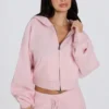Hanorac scurt cu glugă, din tricot moale, cu fermoar, în roz pal Hanorac scurt cu glugă, din tricot moale, cu fermoar, în roz pal