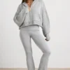 Hanorac scurt cu glugă și fermoar TRUE din tricot gros, în culoarea gri melanj Hanorac scurt cu glugă și fermoar TRUE din tricot gros, în culoarea gri melanj