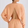 Hanorac scurt cu spate deschis din jersey de bumbac texturat, culoare piersică