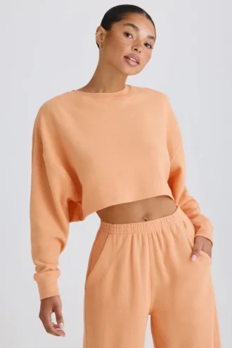 Hanorac scurt cu spate deschis din jersey de bumbac texturat, culoare piersică