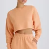 Hanorac scurt cu spate deschis din jersey de bumbac texturat, culoare piersică