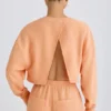 Hanorac scurt cu spate deschis din jersey de bumbac texturat, culoare piersică