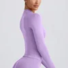 Jachetă cu fermoar Define Luxe în culoarea liliac Jachetă cu fermoar Define Luxe în culoarea liliac