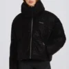 Jachetă de schi impermeabilă, croită scurt, oversized, în model leopard negru Jachetă de schi impermeabilă, croită scurt, oversized, în model leopard negru
