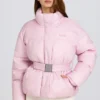 Jachetă de schi impermeabilă, oversized, cu centură, în culoarea roz pudră Jachetă de schi impermeabilă, oversized, cu centură, în culoarea roz pudră