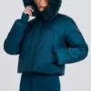 Jachetă de schi scurtă, impermeabilă, cu glugă din blană artificială, în culoarea verde-albăstrui