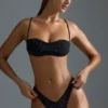 Oh Polly Costume de baie: Slip de bikini cu decupaj în V și picioare înalte, cu ornamente HOTFIX, în negru Oh Polly Costume de baie: Slip de bikini cu decupaj în V și picioare înalte, cu ornamente HOTFIX, în negru