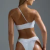 Oh Polly Costume de baie: Top de bikini bandeau cu un umăr, decorat, din ediția HOTFIX, în culoarea alb Oh Polly Costume de baie: Top de bikini bandeau cu un umăr, decorat, din ediția HOTFIX, în culoarea alb