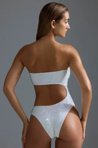 Oh Polly Swim: Costum de baie întreg, decupat și împodobit, ediția HOTFIX, în culoarea alb Oh Polly Swim: Costum de baie întreg, decupat și împodobit, ediția HOTFIX, în culoarea alb