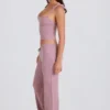 Pantaloni de jogging cu croi larg din tricot cu nervuri, în nuanța Mauve Pantaloni de jogging cu croi larg din tricot cu nervuri, în nuanța Mauve