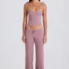Pantaloni de jogging cu croi larg din tricot cu nervuri, în nuanța Mauve Pantaloni de jogging cu croi larg din tricot cu nervuri, în nuanța Mauve