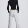 Pantaloni de jogging cu talie joasă și croi larg, în culoarea gri melanj Pantaloni de jogging cu talie joasă și croi larg, în culoarea gri melanj